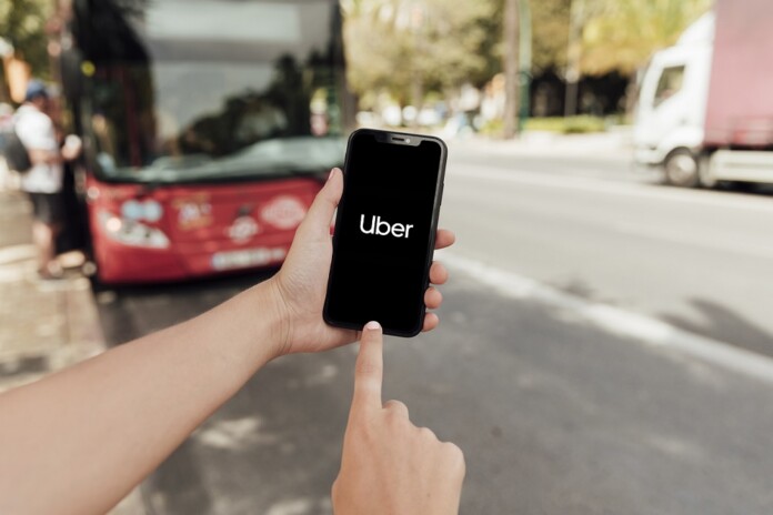 close-up-finger-pointing-at-phone-screen