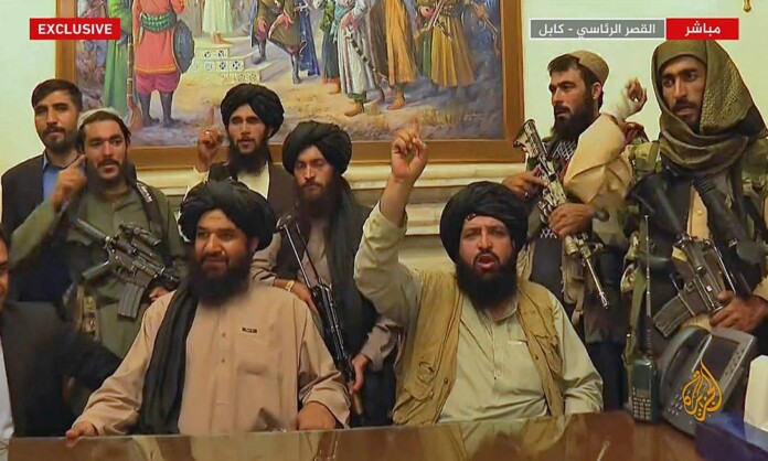 94837321_An-image-grab-taken-from-Qatar-based-Al-Jazeera-television-on-August-16-2021-shows-Members