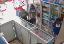 Feminicídio: mulher de 26 anos é assassinada dentro de farmácia por atirador encapuzado